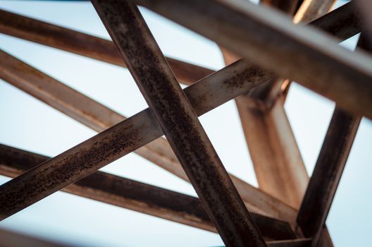 background of metal beams of industrial building closeup
