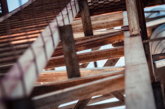 background of metal beams of industrial building closeup