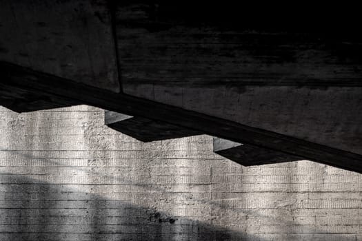 abstract background of gray concrete building wall structure with shadow