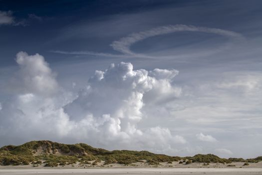 Imposing cloud formations over the dunes on the island of Terschelling 

