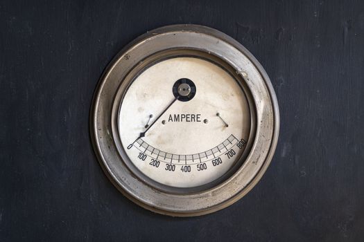 Old ammeter in a machine in a historic factory
