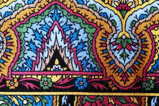 Bright cloth background. Closeup of traditional Asian fabric