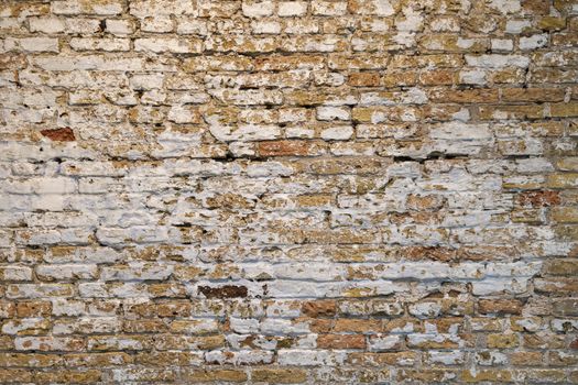 Background Photo of historic yellow brickwork in the North of the Netherlands 
