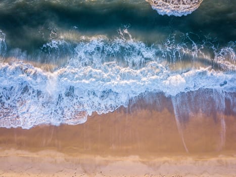 Drone picture of the waves hitting the beach on the Swahili Coast, Tanzania.