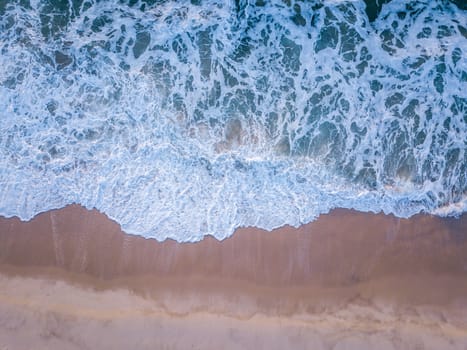 Drone picture of the waves hitting the beach on the Swahili Coast, Tanzania.