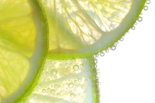 Lemon Slices In Water With Air Bubbles