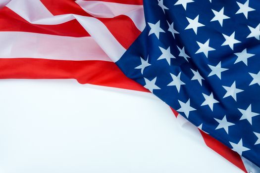 US American flag on white background. For USA Memorial day, Veterans day, Labor day, or 4th of July celebration. Top view, copy space for text.