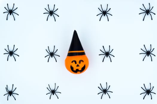 Top view of Halloween decoration, jack o lantern, ghost, bat and spider on white background with copy space for text. halloween concept.