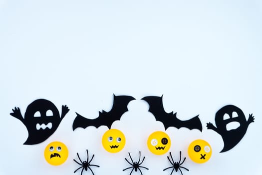 Top view of Halloween decoration, jack o lantern, ghost, bat and spider on white background with copy space for text. halloween concept.