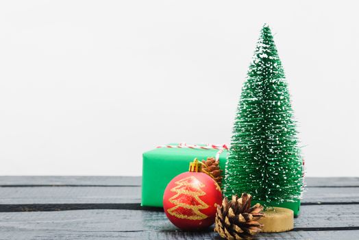 Christmas composition decorations, minimal green fir tree branches with snow on white background. Merry Christmas concept. Copy space for text