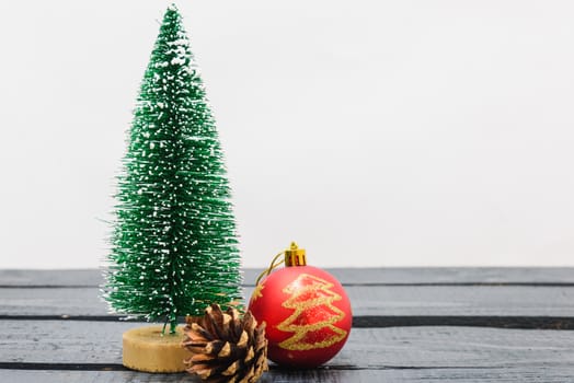 Christmas composition decorations, minimal green fir tree branches with snow on white background. Merry Christmas concept. Copy space for text