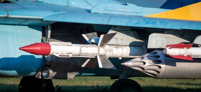 rocket and weapon of military army fighter aircraft close up