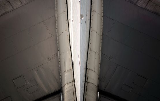 technical aviation background fragment of an airplane wings close up