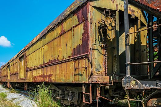 Rust on Yellow Train in Abandoned Yard