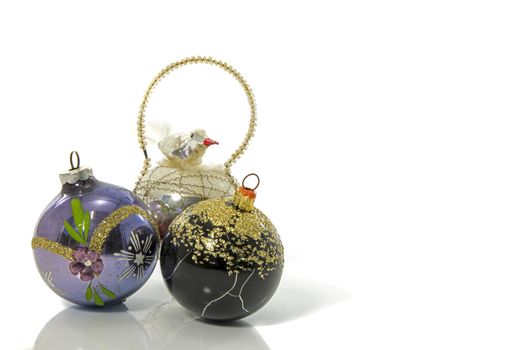 old vintage baubles for the christmas tree with a bird all made from glass