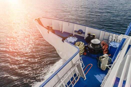 The nose of the ship, the bow of the floating ship, the cruise liner, the yacht, the boat on the background of the blue salt sea, the ocean on the tropical sea warm resort,