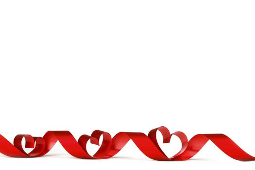 Red heart shaped ribbon isolated on white background Valentines day design