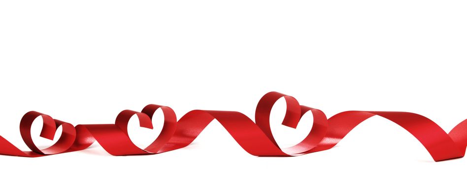 Red heart shaped ribbon isolated on white background Valentines day design