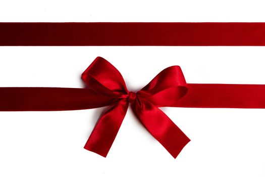 Elegant satin red ribbon bow isolated on white background