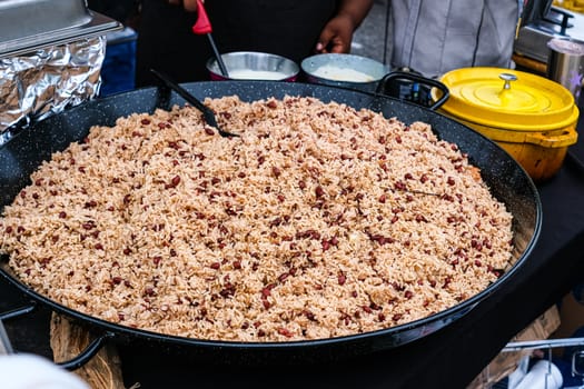 A Huge Wok full of Red Beans and Rice at a Night market
