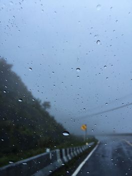 Low a visibility on driving. Dangerous drive a car on downhills road. Blur backgroud,