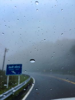 Low a visibility on driving. Dangerous drive a car on downhills road. Blur backgroud,