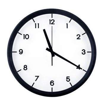 Classic analog clock pointing at eleven twenty, isolated on white background.