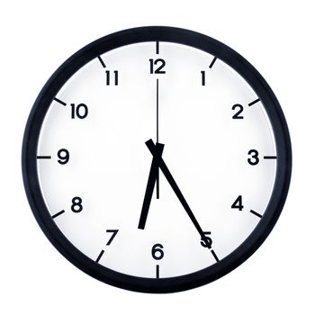 Classic analog clock pointing at six twenty five, isolated on white background.