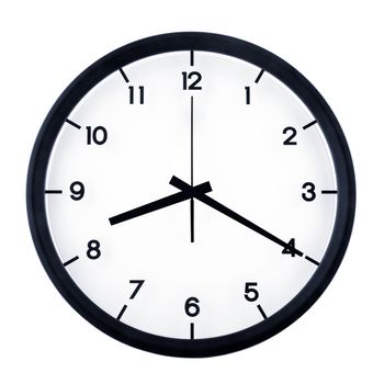 Classic analog clock pointing at eight twenty, isolated on white background.
