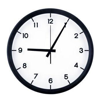 Classic analog clock pointing at nine O five, isolated on white background.