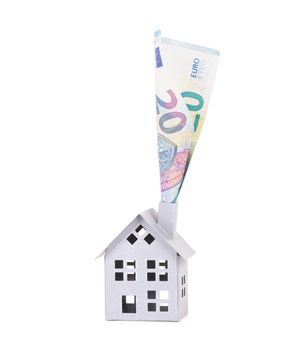 Buying a house, burning money, isolated on white