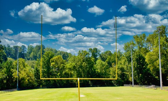 Two goal posts on an American football field