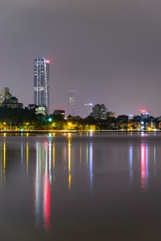 Hanoi skylines reflection at West Lake Ho Tay . Hanoi is capital of Vietnam. Colorful cityscapes and urban concept