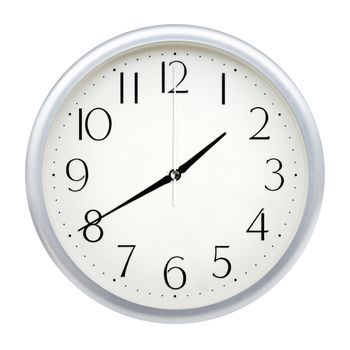 Analog wall clock isolated on white background.