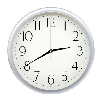 Analog wall clock isolated on white background.