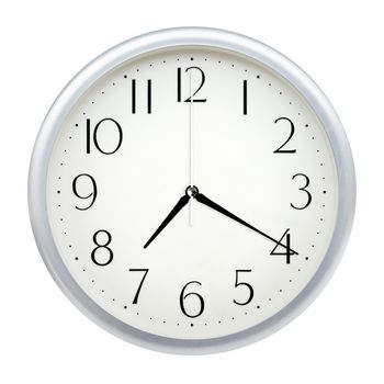 Analog wall clock isolated on white background.