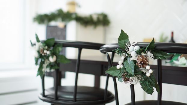 Interior light kitchen with christmas decor and bar chair