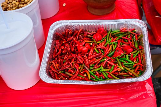 Hot Red and Green Peppers in an Aluminum pan at a night market