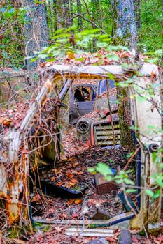 Rusty Truck Through Missing Doors in a Junkyard