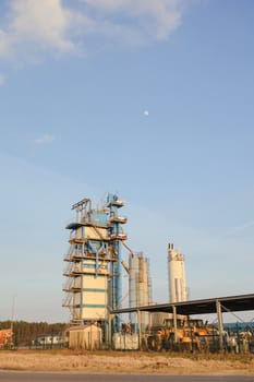 Modern industrial exterior building over blue sky