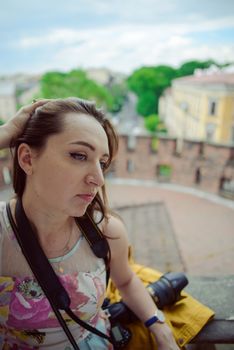 Beautiful girl during sightseeing old castle in Cracow, Wawel. Summer time