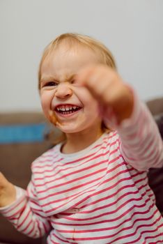 Portrait of adorable baby girl. Childhood. Authentic image