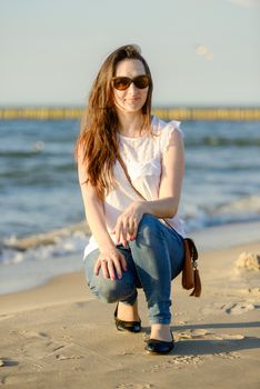 Portrait of smiling young woman enjoying the time.