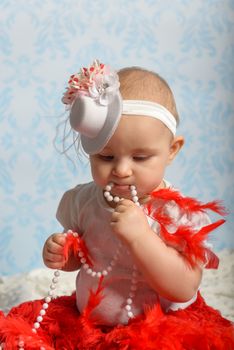 Portrait of adorable baby girl. Childhood. Authentic image