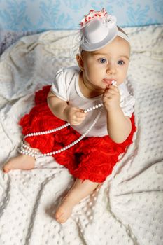 Portrait of adorable baby girl. Childhood. Authentic image