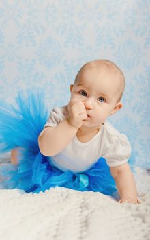 Portrait of adorable baby girl. Childhood. Authentic image