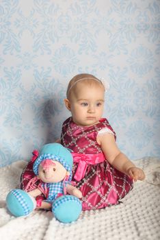 Portrait of adorable baby girl. Childhood. Authentic image