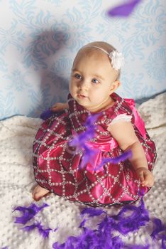 Portrait of adorable baby girl. Childhood. Authentic image