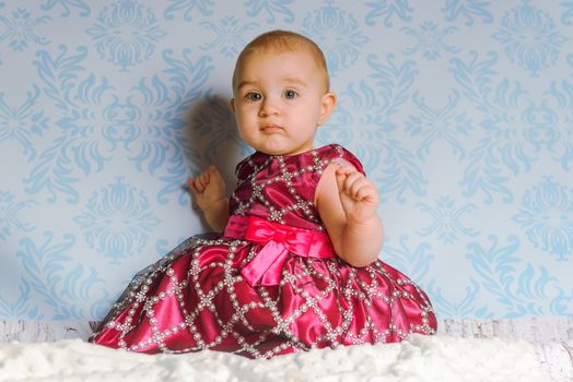 Portrait of adorable baby girl. Childhood. Authentic image