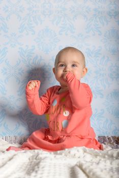 Portrait of adorable baby girl. Childhood. Authentic image